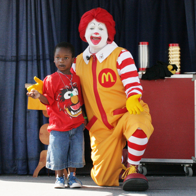 Ronald McDonald with a kid
